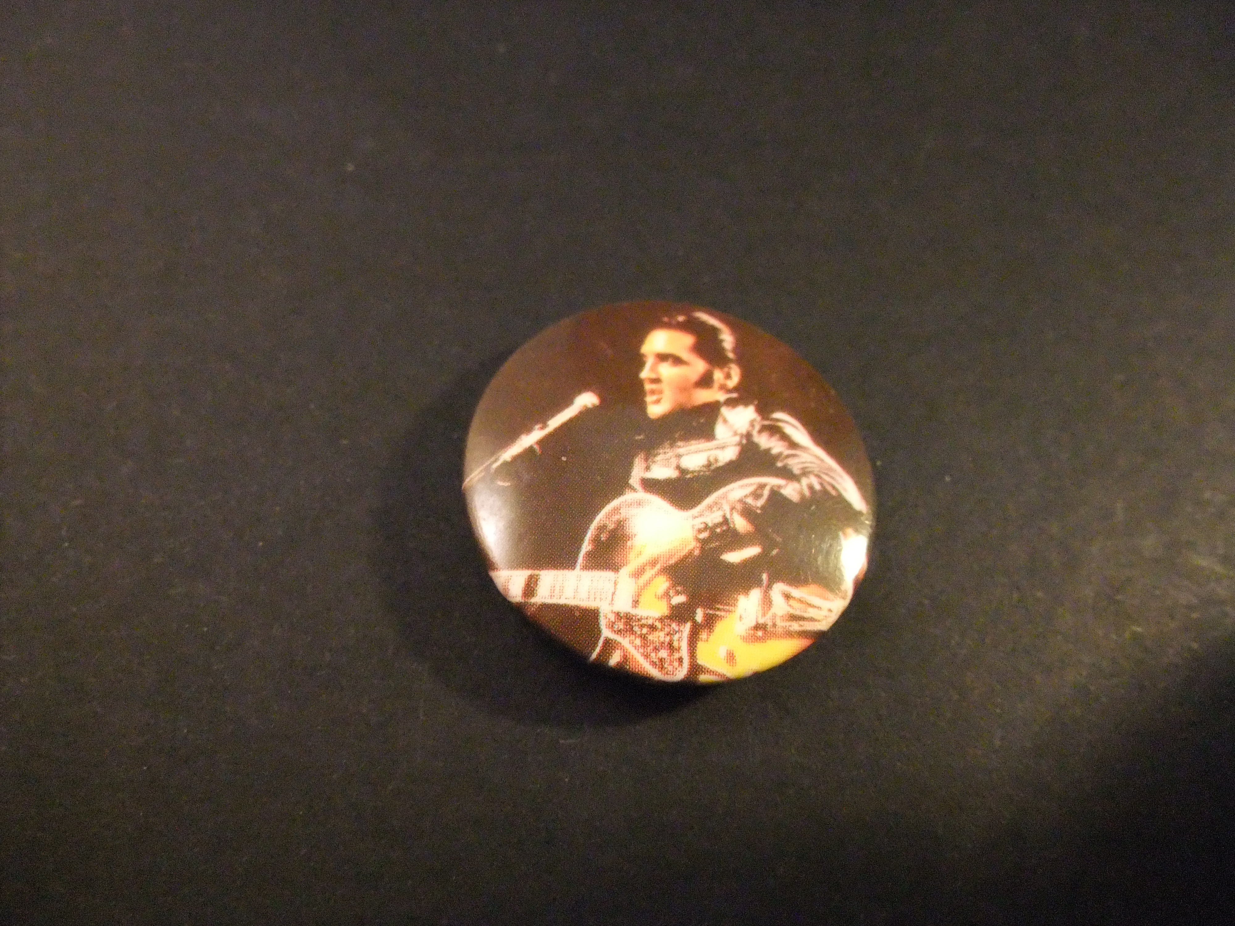 Elvis Presley king of rock met gitaar